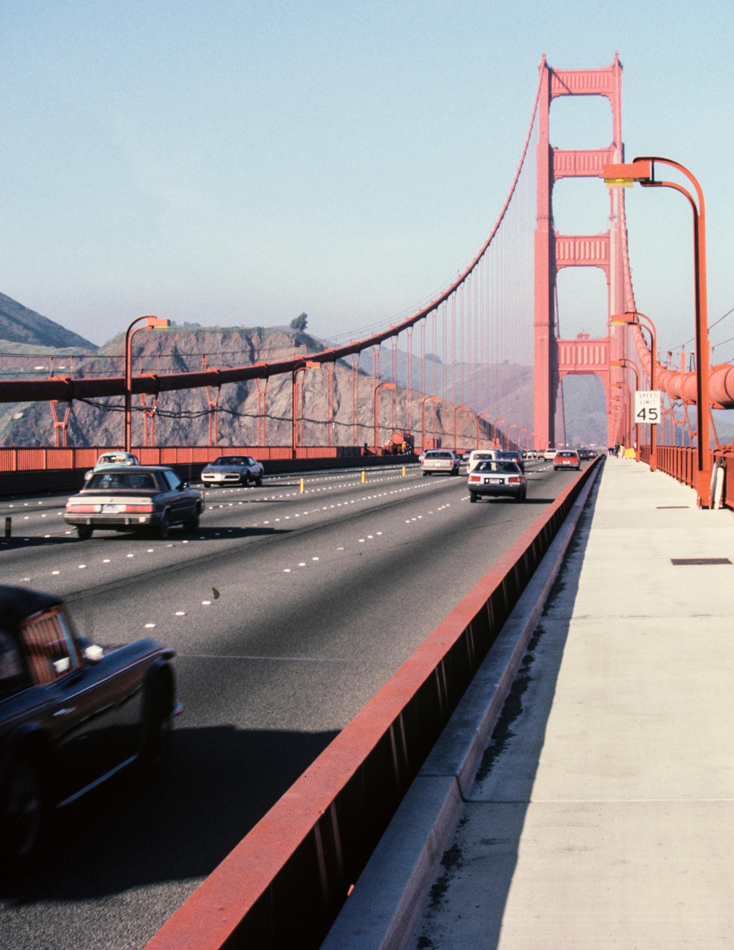 Vintage photo of traffic on the Golden Gate Bridge San Francisco, California, USA. January 6, 1985.