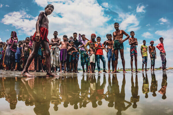 Flood affected villages in Northern Bangladesh, highlighting the submerged homes, affected communities, the severe impact and the resilience