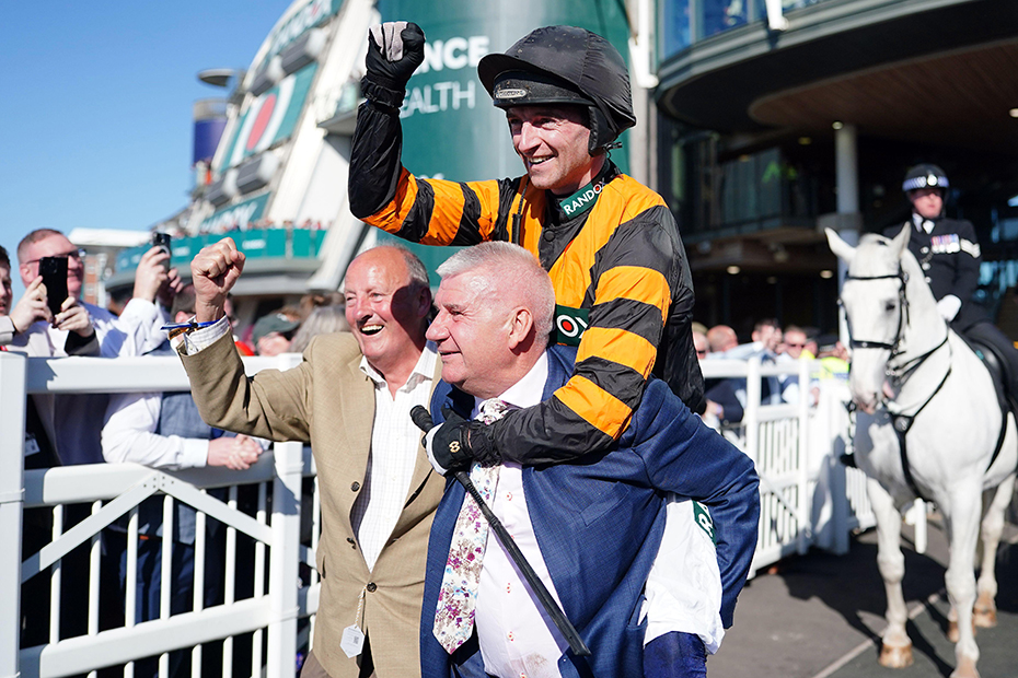 Jockey Patrick Mullins and owner Stewart Andrew after winning the Randox Grand National Handicap Chase with Nick Rockett on day three of the Randox Grand National Festival at Aintree Racecourse, Liverpool. 