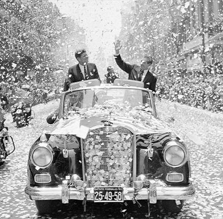 U.S. President John F. Kennedy and Mexican President Adolfo Lopez Mateos are showered with confetti and paper as they travel down a boulevard in Mexico City, shortly after Kennedy's arrival for a three-day visit. Monday, May 29, 2017